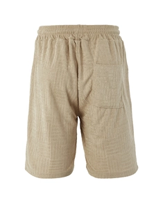 Detail of men's beige shorts showing geometric textured towel fabric and back pocket