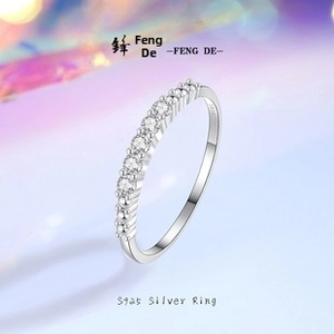 Detailed macro view of S925 sterling silver ring with shimmering cubic zirconia stones