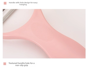Detail of pink matte non-slip handle with hanging hole for ceramic potato peeler