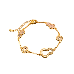 24k gold plated calabash and coin bracelet with white zircon inlay on white background