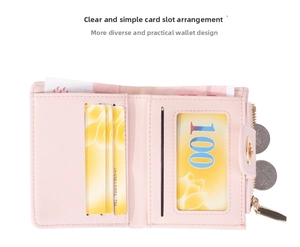 Interior detail of pink leather bifold wallet with card slots, ID window and coin pocket