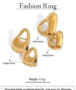 Detailed size specifications for gold heart earrings showing height 33mm and width 20mm