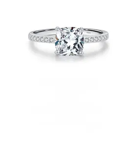 Macro view of S925 sterling silver band with cushion cut zircon and side pave diamonds