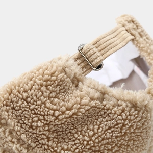 Beige faux shearling baseball cap with adjustable corduroy strap and metal buckle