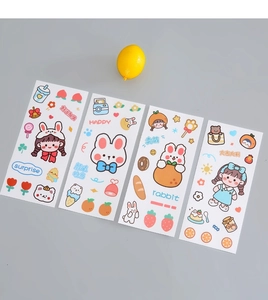 Close-up of four cute cartoon rabbit PVC stickers with colorful girl and dessert patterns