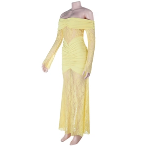 Detail of off-shoulder lace splicing and ruched fabric on a bright yellow slim fit dress