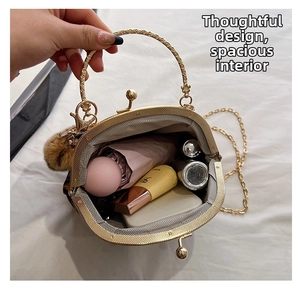 Detail showing internal capacity of the leopard print handbag with daily essentials