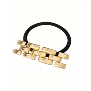 Close-up of a minimalist black elastic hair tie featuring a polished gold metal chain decor