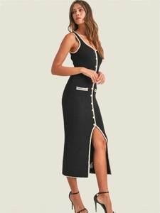 Slim fit knitted sleeveless dress in black with white trim and button details