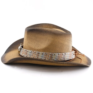 Close-up of straw cowboy hat featuring metallic rivets and vintage leather strap detail