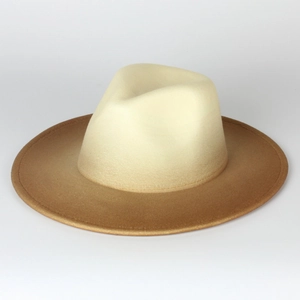 Close-up side view of a gradient wool felt fedora hat with cream to tan transition.