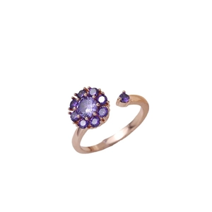 Elegant rose gold flower ring with purple crystals in a rotating open design