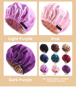 Close-up of adjustable buckles and various color swatches for satin hair bonnets