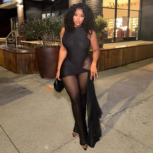 Detail of sheer mesh jumpsuit with side drawstring and high-cut bodysuit design