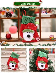 Detail view of mini sequin Christmas stocking with bear hanging on a decorated fireplace
