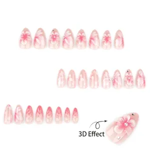 Press-on nails with 3D floral design, nude pink gradient, and elegant pearls decorations