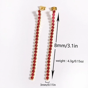 Detailed view of long gold drop earrings with inlaid red zircon and dimensions