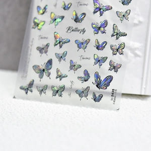 Holographic 3D embossed butterfly nail art stickers with iridescent blue and green laser effect