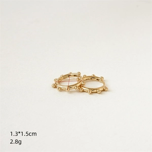 Chic 14K gold plated hoop earrings with beaded texture and 925 silver stamp details