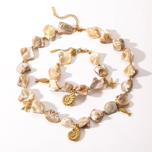 Natural shell necklace and bracelet set with golden starfish and conch charms