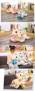 Rainbow plush unicorn showing soft textures and 40cm to 80cm sizes in home setting