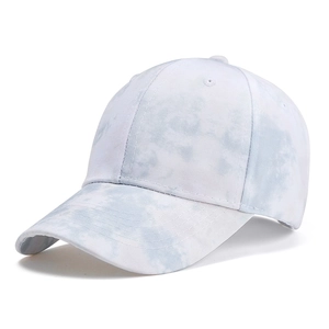 Detailed view of the blue and white tie-dye cotton fabric and stitching on baseball cap