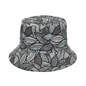 Detail of tropical plant leaf pattern printed on cotton fabric of the reversible bucket hat