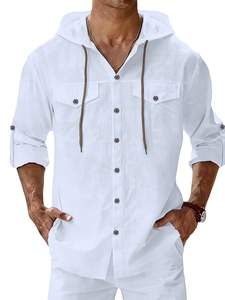 Detail of white linen hooded shirt with double chest pockets and drawstring closure