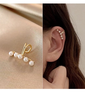 Detail of 14k gold-plated cuff earring with 5 pearls for non-pierced ears