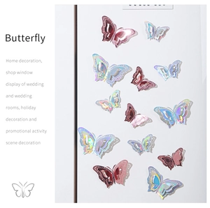Detail of 3D laser hollow butterfly wall stickers in pink and silver on white background
