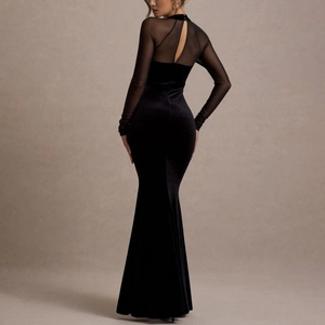Detail view of the elegant open back with sheer mesh and premium black velvet fabric