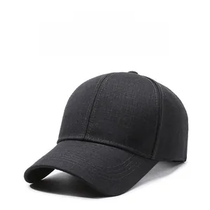 Detail of grey baseball cap with breathable fabric and silver M letter metal decor