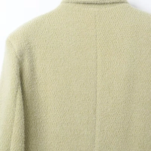 Stijlvolle pistachegroene wollen jas voor dames met getextureerde stof en nette revers