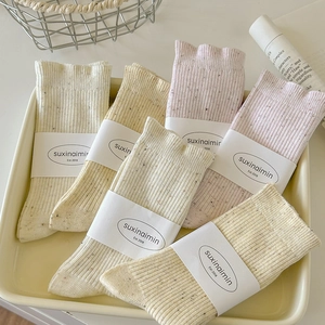 Five-pack of Japanese style ribbed socks with colorful dots in cream, yellow, and pink colors