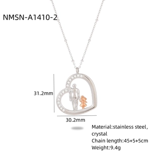 Detailed view of heart necklace with crystal frame showing father and daughter pendant