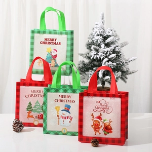 Set of 4 non-woven Christmas gift bags with festive plaid patterns and Santa illustrations