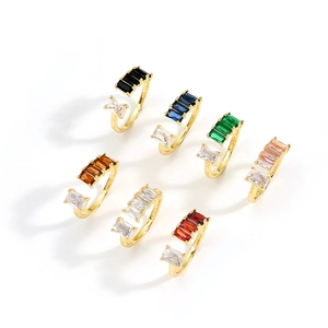 Adjustable gold rings set with colorful rectangular zircons in a minimalist style
