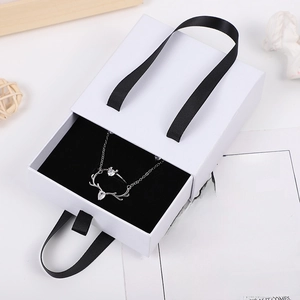 Silver antler necklace and ring set with white zircon in a white drawer jewelry gift box