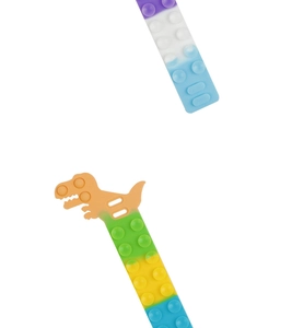 Macro detail of silicone pop suction bracelets with dinosaur charms and gradient colors