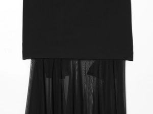 Detailed view of black mesh patchwork and premium fabric texture on elegant long dress