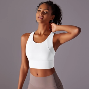 Detail of white high-impact sports bra with wide straps and breathable fabric
