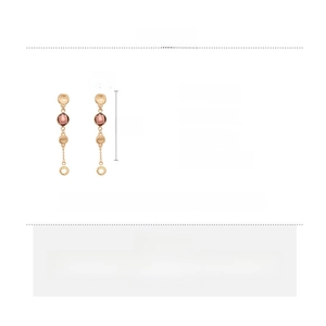 Detail view of gold tassel earrings with red gems including dimensions and alloy material