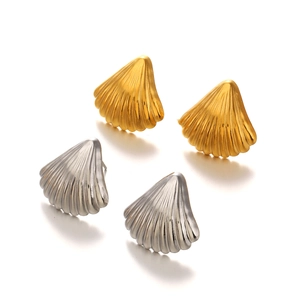 Fashionable shell-shaped stud earrings in gold and silver finish for beach vacation style