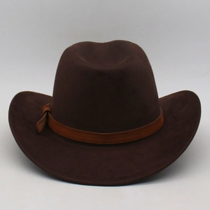 Detail of vintage dark brown faux suede cowboy hat with leather band and metal buckle