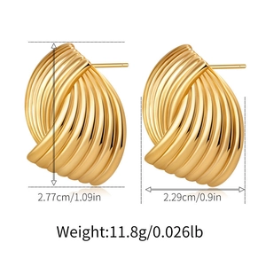 Detailed view of gold textured irregular earrings with size and weight measurements