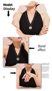 Détail d'un ensemble de bijoux cœur doré avec pierres roses et bagues larges