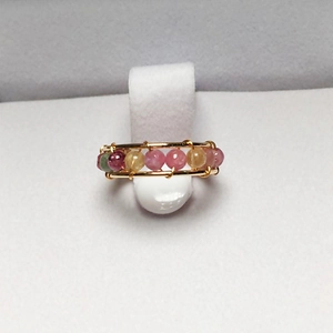 Detailed view of handmade 14K gold-filled wire wrapped ring with colorful tourmaline beads