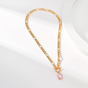 Gold Figaro chain necklace with pink rectangle gemstone pendant and OT clasp toggle