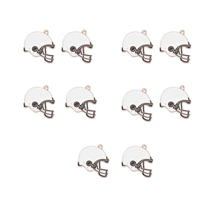 Close-up of 10 white American football helmet charms with rose gold metal finish