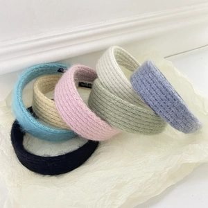 Chic vintage plush knitted headbands for women in multiple colors with handmade labels